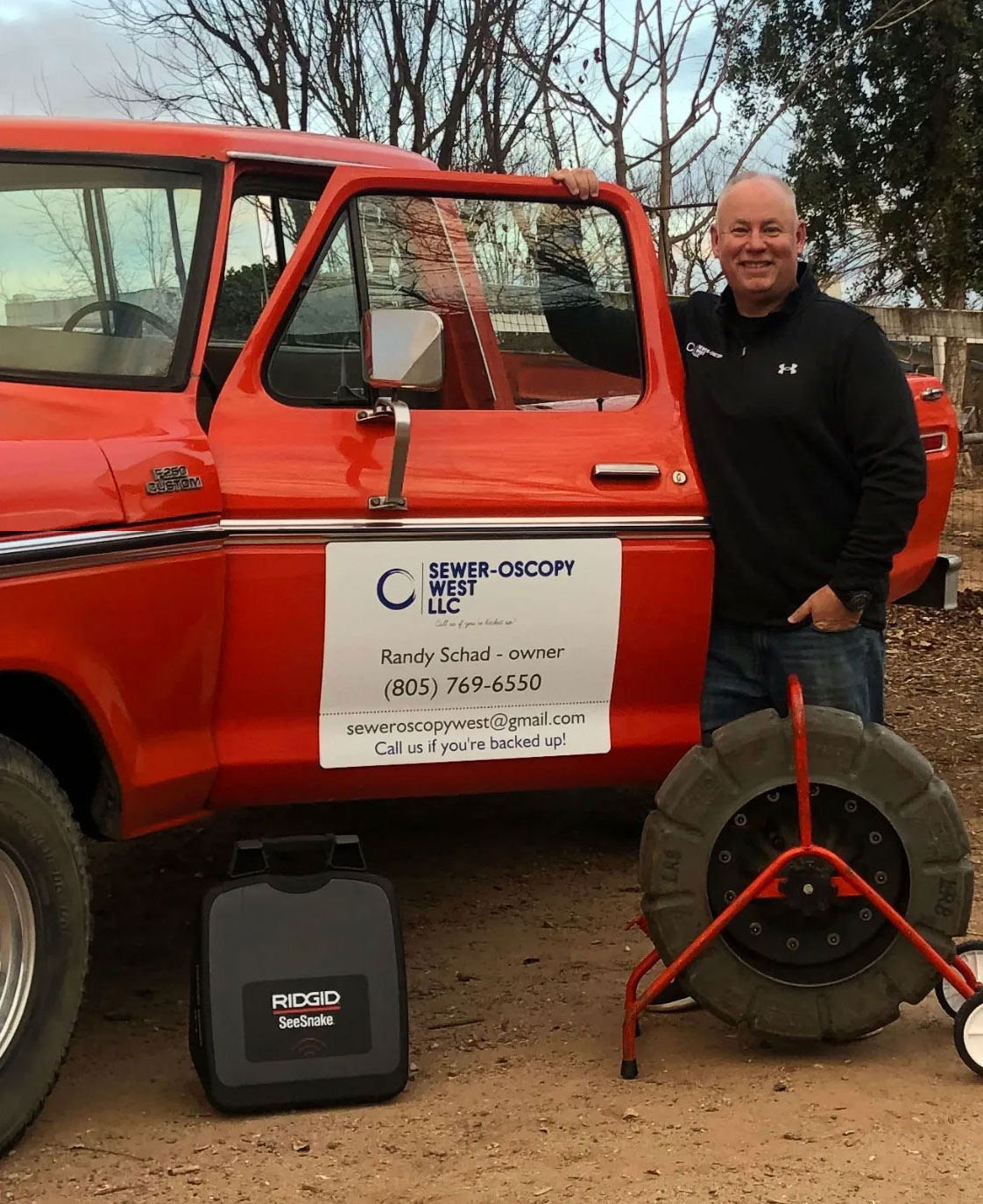 Randy at his truck with his sewer inspection equipment
